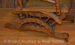 Antique Oak glider rocker, spindle back, upholstered seat **BROWN AUCTION WILL NOT SHIP THIS ITEM.