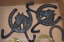 Assortment of coat, hat and towel hooks (horseshoe and steers) + other novelty horseshoes