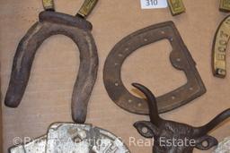 Assortment of coat, hat and towel hooks (horseshoe and steers) + other novelty horseshoes