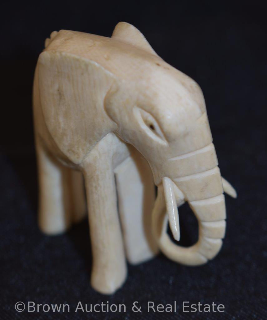 (2) Oriental hand carved elephant pieces