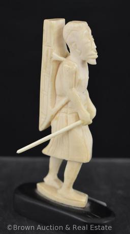 Oriental hand carved 5"h figurine, man with backpack and walking stick