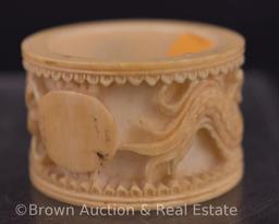 Pr. Of Oriental hand carved napkin rings
