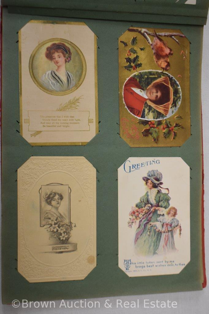 Post card album full of mostly portrait cards