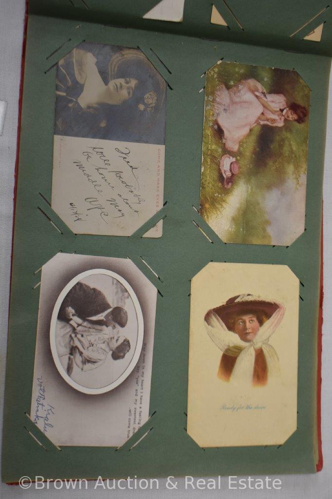 Post card album full of mostly portrait cards