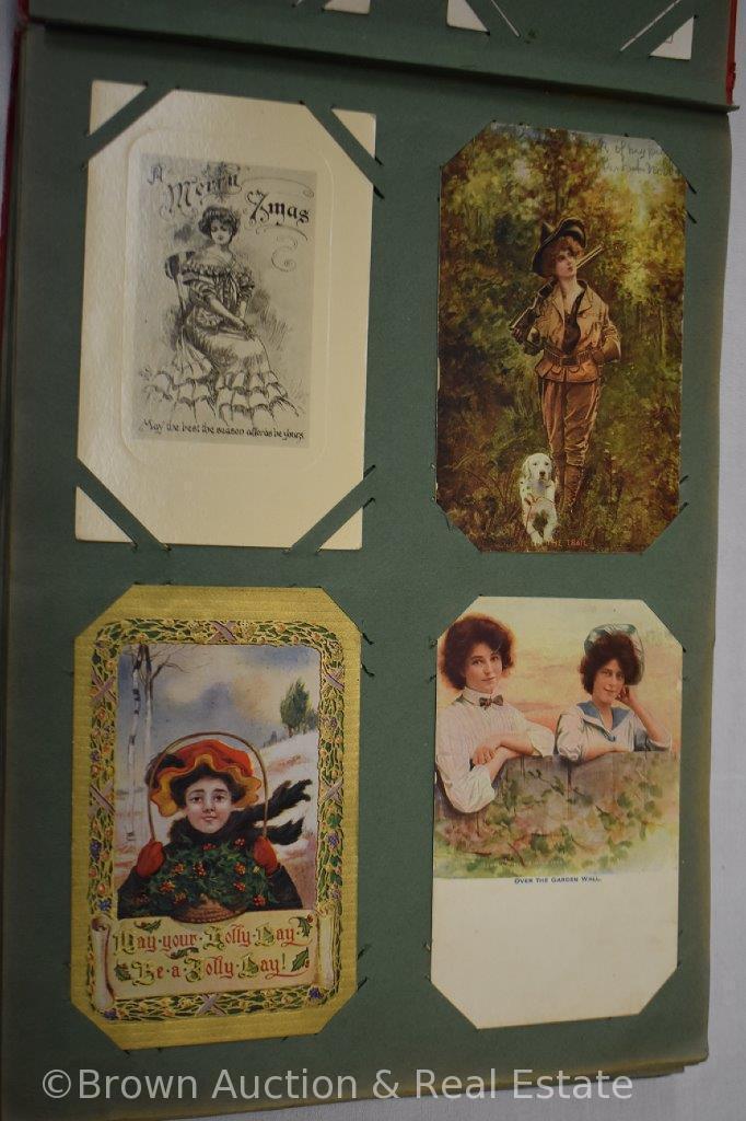 Post card album full of mostly portrait cards