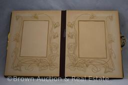 Vintage photo album with scenic celluloid cover