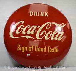 Coca-Cola button sign