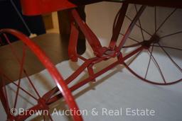 Hand-made buckboard wooden wagon on Studebaker frame