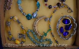 Costume jewelry - necklaces, earrings, brooches and bracelets