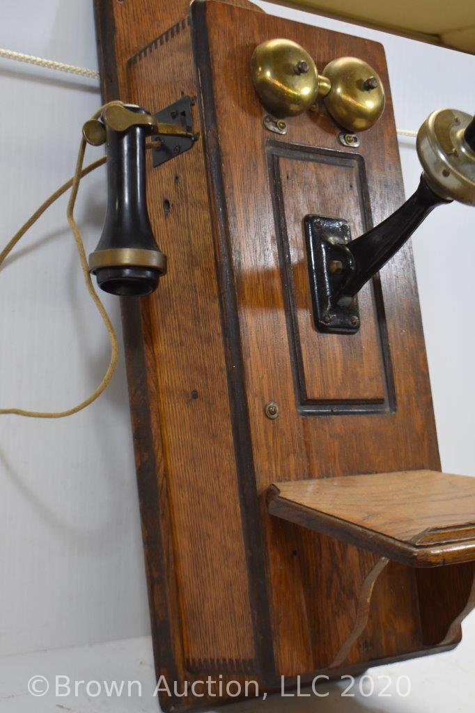 Oak wall crank telephone, The Western Supply Co.