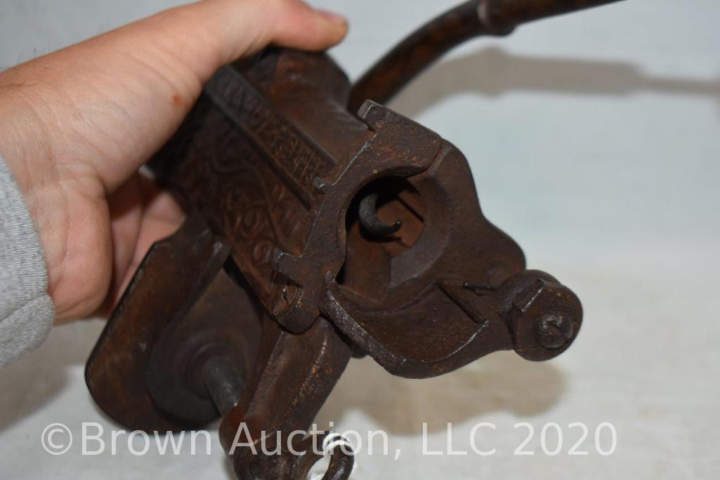 (2) Cast Iron pieces: Champion bar screw/automatic bottle opener; gear driven "Squirrel Cracker" nut