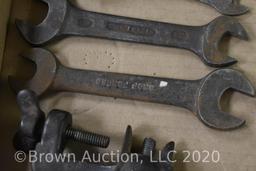 Assorted cast iron tools (wrenches) and corn husker with wire mesh thumb guard