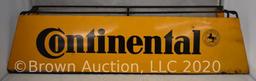 Continental metal tire stand sign