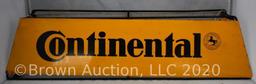 Continental metal tire stand sign