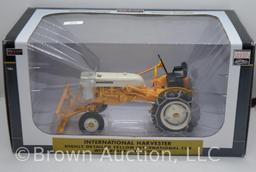 International Harvester Cub tractor with blade and chains, 1:16 scale die-cast