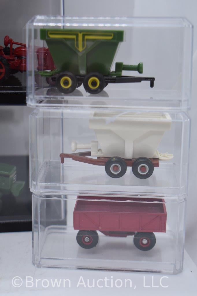 assortment of die-cast Tractors and Implementss, mostly 1:64 scale