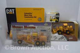 assortment of die-cast construction tools