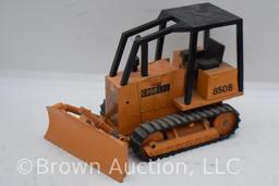 assortment of die-cast construction tools