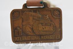 (2) International Harvester watch fobs w/ leather straps