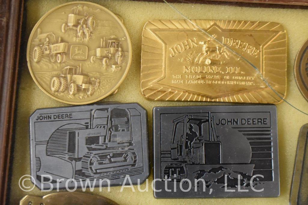 (21) John Deere belt buckles