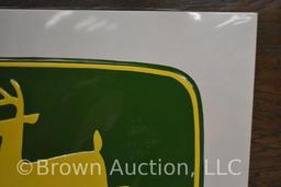 John Deere embossed metal sign