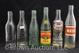 (6) Assorted soda bottles