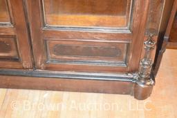 Antique china cabinet with decorative top, dbl. glass doors front