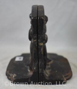 Pr. Verona bookends depicting couple praying over their crops