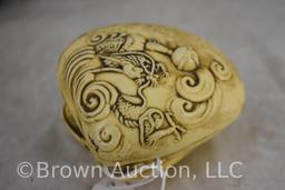 Carved Japanese clam shell diorama scene in Netsuke style