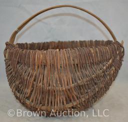 Vintage curved wicker basket