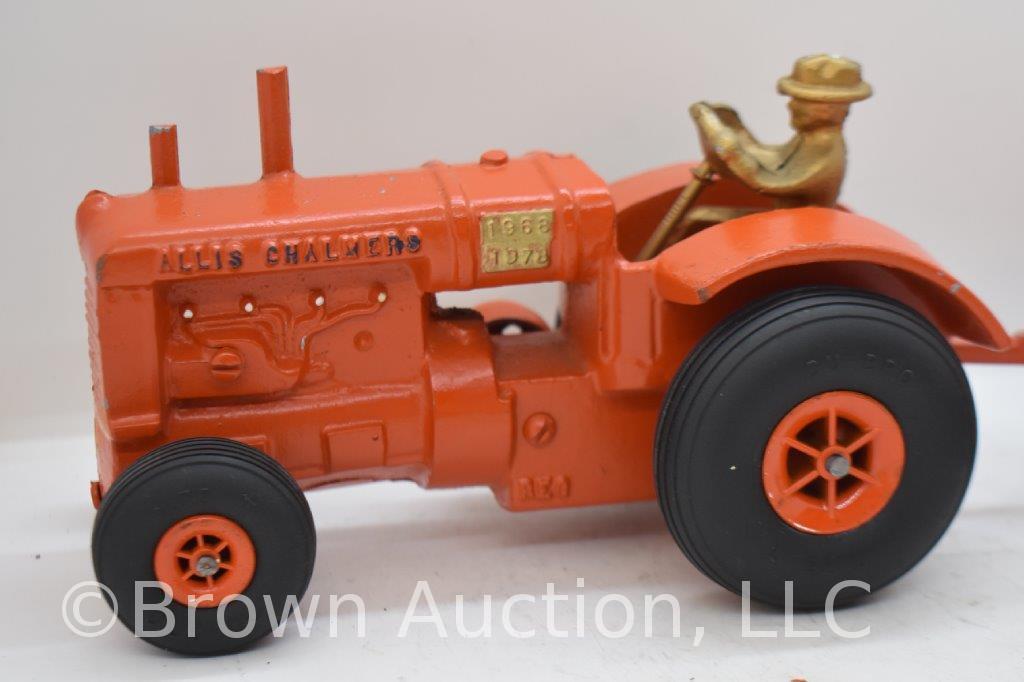 Allis-Chalmers cast iron tractor with grain drill