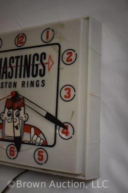 Hastings Piston Rings light-up advertising clock