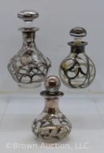 (3) Small crystal perfume bottles with Sterling silver overlay designs