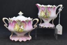 R.S. Prussia Mold 664 creamer and cov. sugar, floral design on pink ground