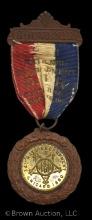 1900 "Souvenir National Encampment G.A.R. (Chicago) badge on red, white and blue ribbon