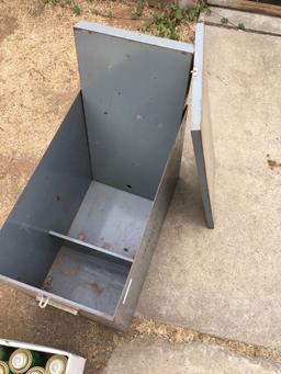 Empty metal bin with lid