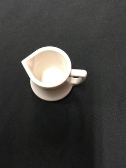 New 2 oz creamer with handle, 144 pieces