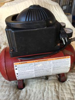 Coleman PowerMate 2 gallon air compressor, 115 V, works good