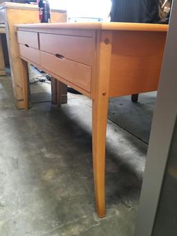 28 1/2" x 53" x 17" four drawer table