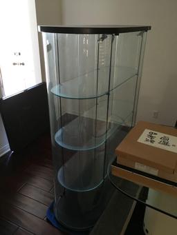 63" x 48" x 21", 3 tier, glass, locking cabinet. Lights up see pics