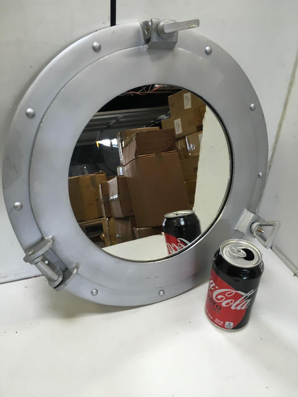 New nautical. 15" silver finish mirrored portholes