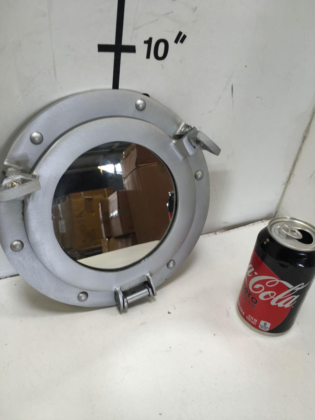 New nautical. 9" silver finish mirrored portholes