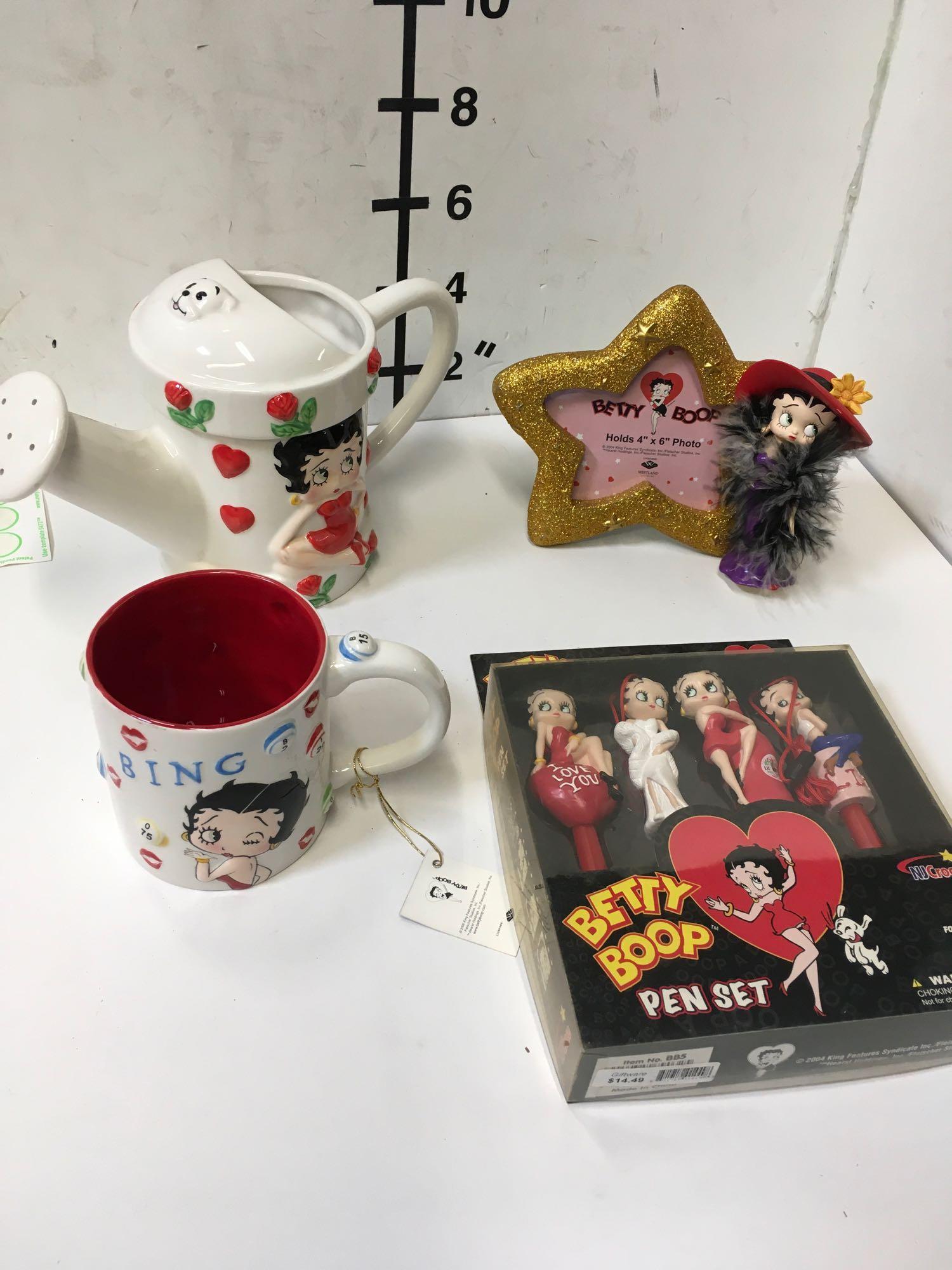 Collectible Betty Boop pen set, picture frame, water can, coffee cup