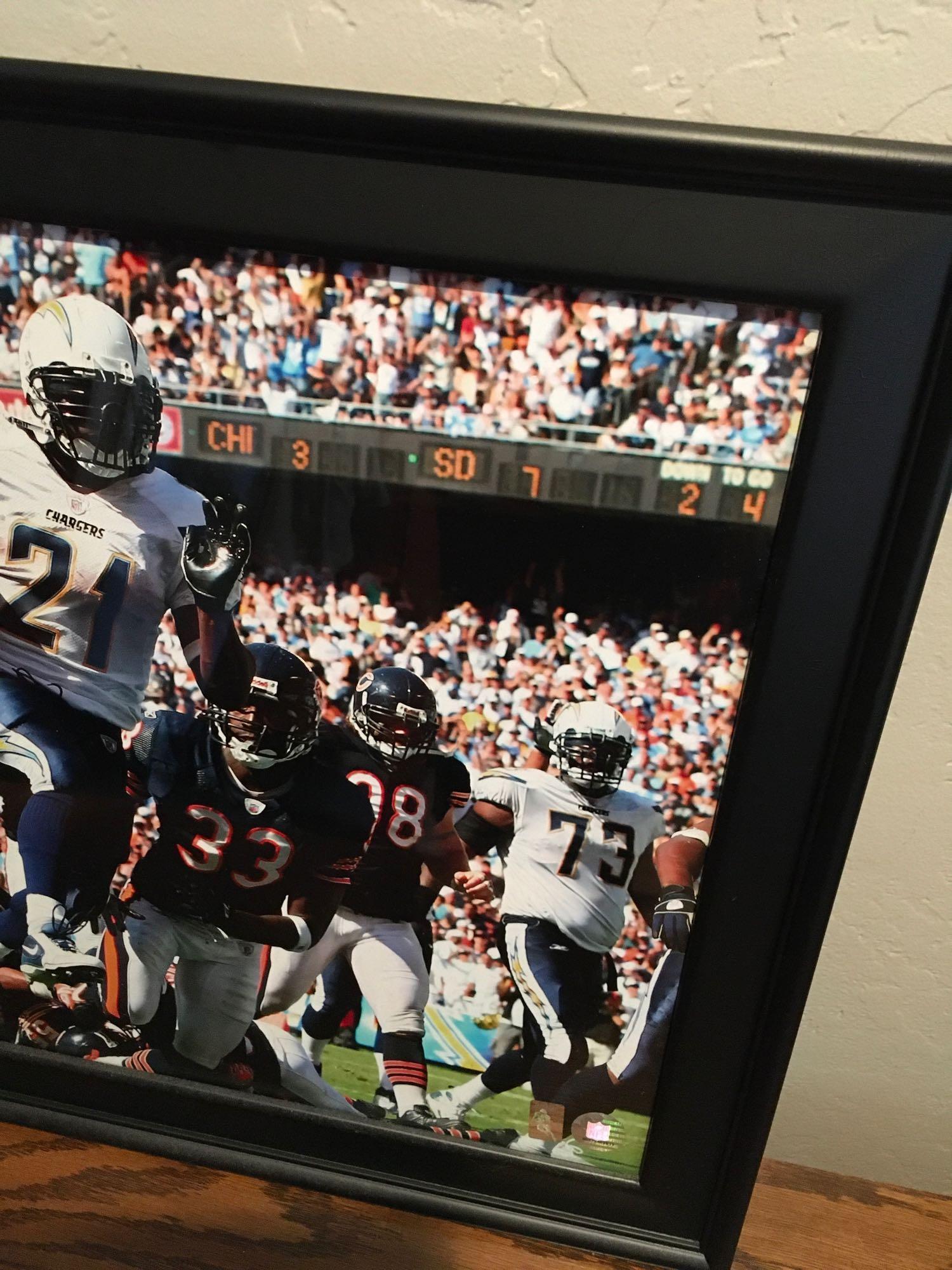 Framed, signed, LaDainian Tomlinson picture. Certificate of Authenticity in the back see pic