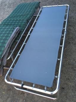 Folding cots with pads