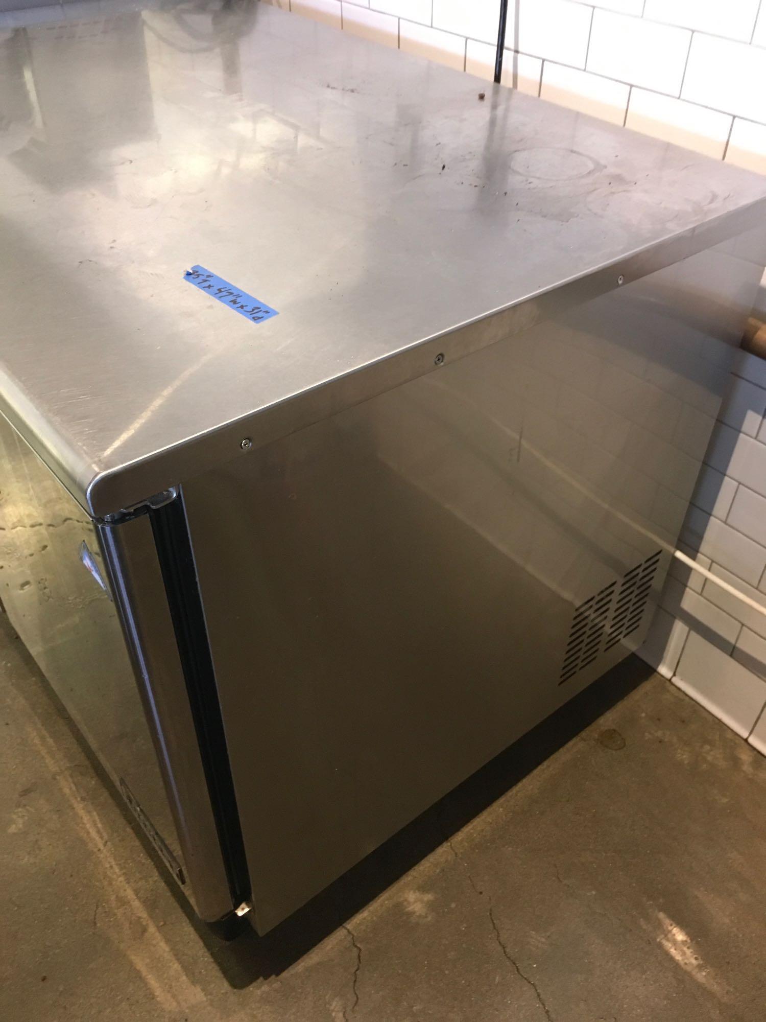 Everest Refrigeration, model ETBR2 on casters. 35" x 47"x 31"  Works