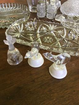 12 pieces. Crystal, glass, plastic pieces. Serving dishes, carafe, condiment caddy, etc