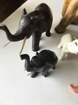 10 assorted elephant figurines. Wood, 1) Lenox porcelain 1) made in Italy broken tusk, etc