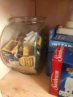 Lot of assorted matches, electrical cords, rope, bulbs, etc