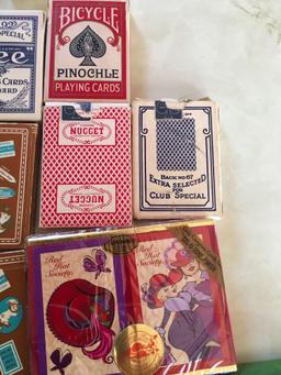 Lot. Vintage (16) sets of playing cards & (4) miniature cars